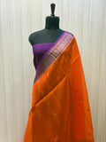 Burnt Orange Kora Banarasi Saree with Royal Purple Zari Border